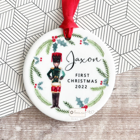 Personalised Baby’s First Christmas New Baby Boy Girl Newborn Nutcracker theme Holly Wreath Greenery Ceramic Round Decoration
