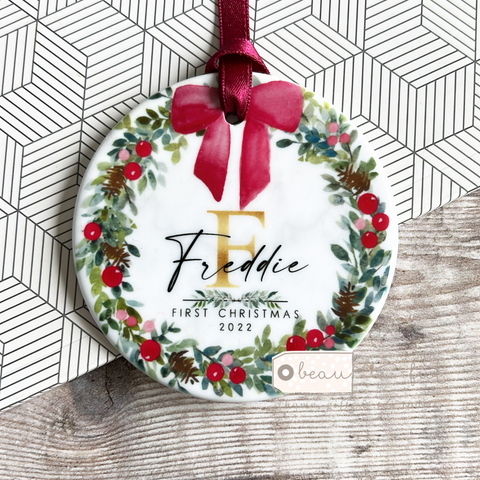 Personalised Baby’s First Christmas Bow greenery Ceramic round Tree Decoration