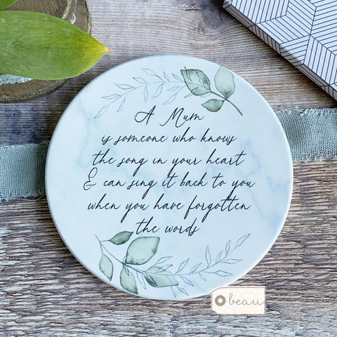 A .... is someone who knows the song in your heart  Quote ceramic Coaster