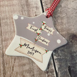 Personalised Baby's First Christmas Signpost Ceramic Star Christmas Decoration Ornament